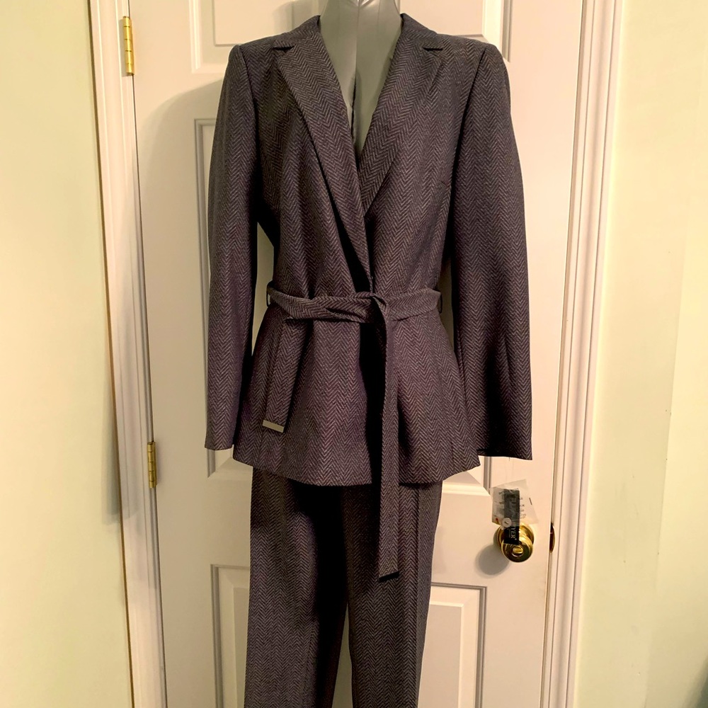 This is a brand new John Meyer, size 14 two piece pant suit. NWT